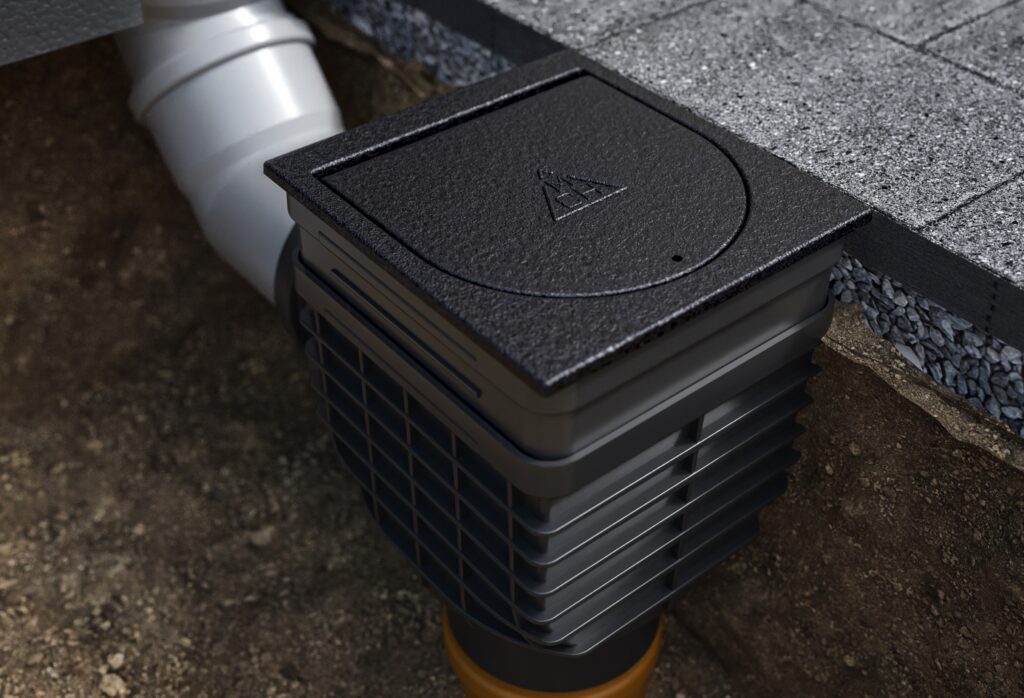 Rainwater collector with rear inlet and cast iron surface